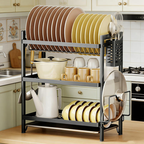 Kitchen dish rack with plates, mugs, and pots in a home setting.